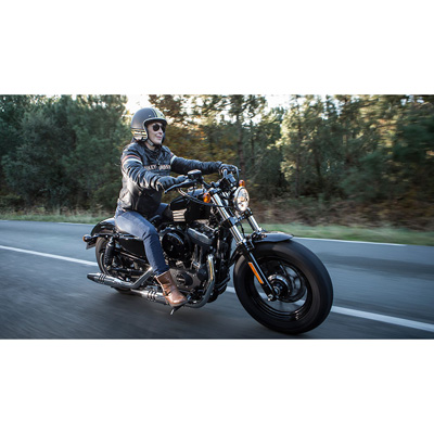 a person is riding motorcycle with Scorcher 21 Motorcycle Tire installed