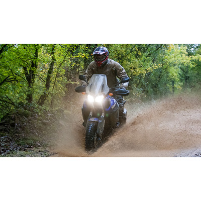  a person is riding adventure motorcycle with Anakee Wild Dual Sport Tire