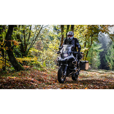  a person is riding adventure motorcycle with Anakee Wild Dual Sport Tire