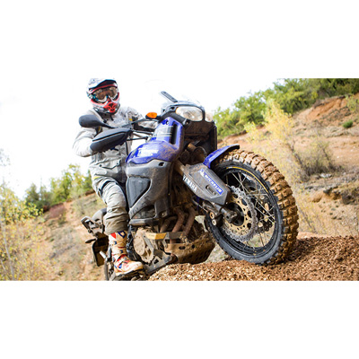  a person is riding adventure motorcycle with Anakee Wild Dual Sport Tire front view