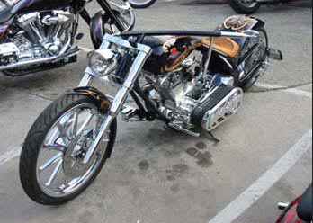 Bandit Wheels in Chrome finish installed on motorcycle, Left/Front side angled view