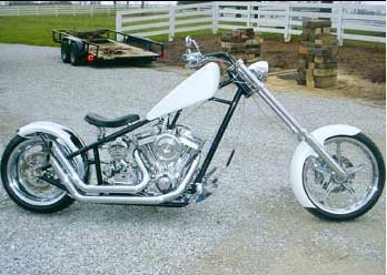 Outlaw front and rear wheel shown on motorcycle chrome finish, side view