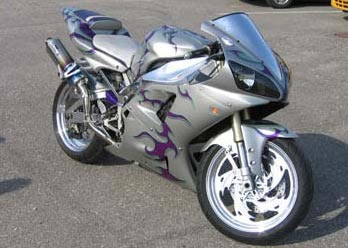 Wicked front and rear wheel shown on motorcycle, chrome finish